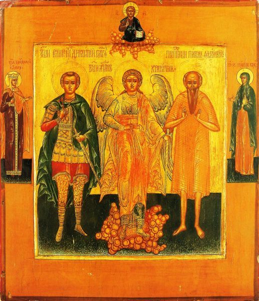 In het midden de engelbewaarder (op een wolk) met aan zijn rechterhand (voor ons links) Demetrius van Thessalonica (+ 303; feest 8 okt) en aan zijn linkerhand (voor ons rechts) Paulus van Obnora (of Komelski: + 1429; feest 10 jan). Links op de rand keizerin Olga de Wijze van Kiev; rechts Maria Magdalena; boven: Christus in de wolken.