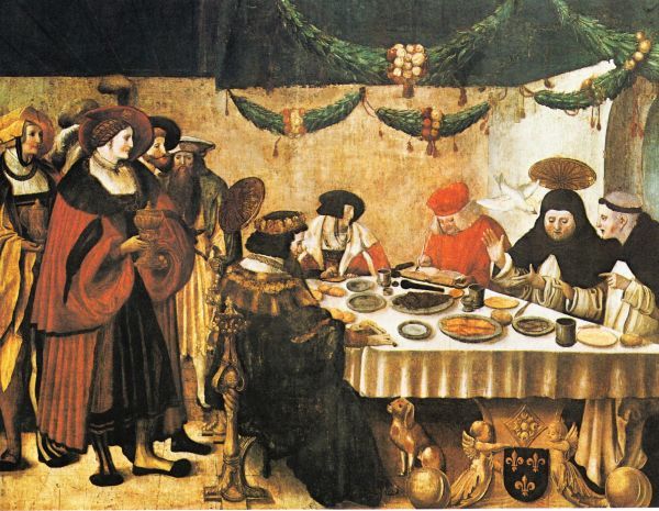 Thomas (met heiligenkransje boven zich) aan tafel bij koning Lodewijk, in gesprek met een medebroeder dominicaan (links van hem) en (rechts van hem) een kardinaal. Hij wordt geïnspireerd door de Heilige Geest, voorgesteld als een witte duif. vóór 1530, Manuel Deutsch, paneelschildering.