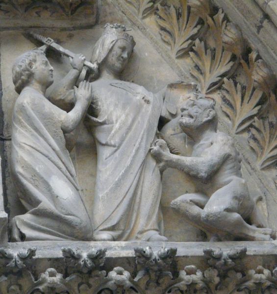 Theofilus door Maria verlost van de duivel. ± 1300, steensculptuur.