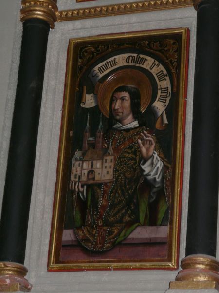 Met model van de St-Kastorkerk van Koblenz in de hand.