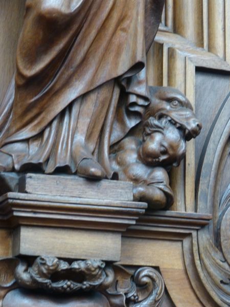 Arnicius met - aan zijn voeten - de wolvin met het kind in de bek.