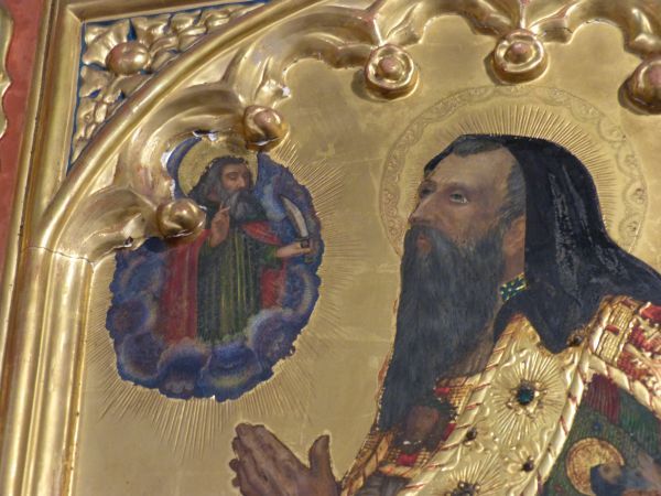 Sint Bartolomeus (met zijn attribuut: mes) moedigt Guthlac aan om vol te houden