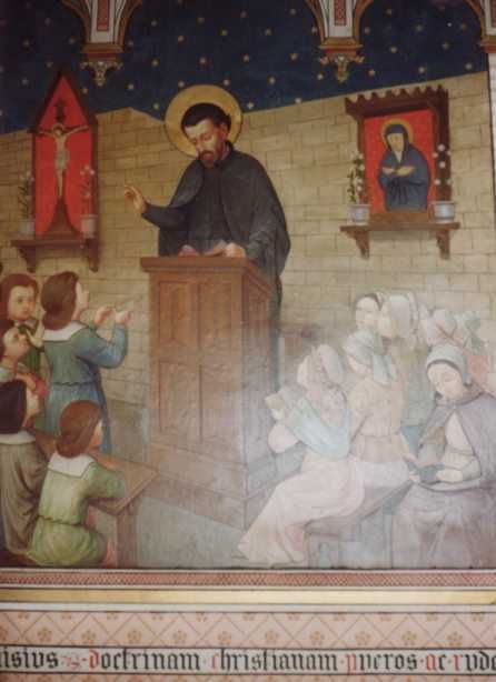 Petrus Canisius geeft geloofsonderricht aan kinderen en ongeschoolden.
