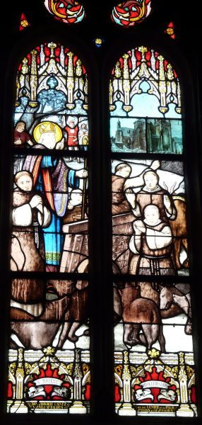 Wolvenwonder. De heilige bisschop Brieuc is omringd door zijn monniken; sommigen slaan al op de vlucht voor de wolven. Op de achtergrond de (huidige) kathedraal van St-Brieuc.