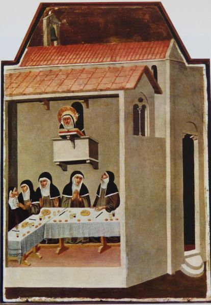 Humiltà leest voor tijdens de maaltijd. De zogeheten refterlezing tijdens de maaltijd was (is) een werk van nederigheid; immers je bent genoodzaakt achteraf te eten. vóór 1348, Pietro Lorenzetti, paneelschildering.