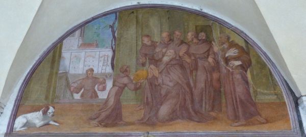 De jonge Onufrius brengt het brood bij vader abt.