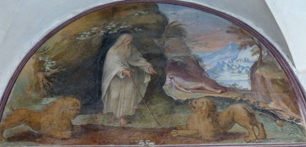 Leeuwen delven het graf voor Onufrius.