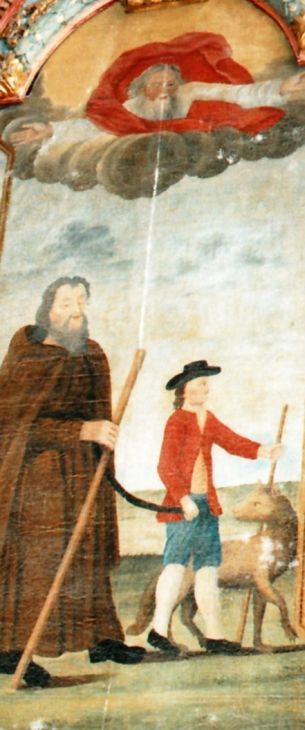 God kijkt vanuit de hemel met welgevallen neer op Hervé met geleide en wolf.