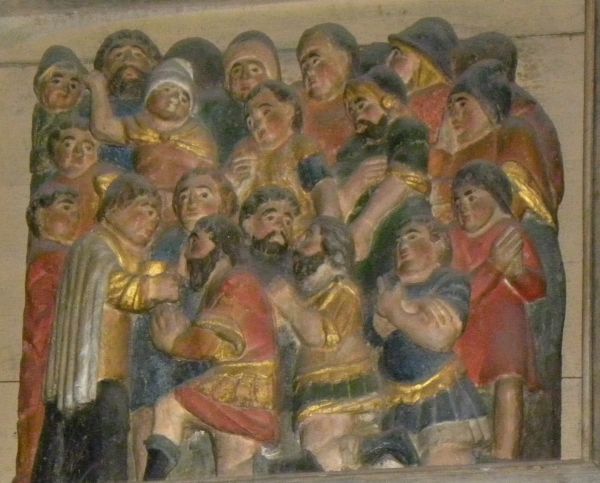 ± 1624, houtreliëf. De soldaten ontvangen de communie.