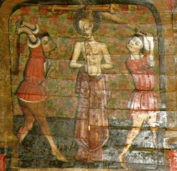 Aan de haren opgehangen wordt Margareta met knuppels geslagen.