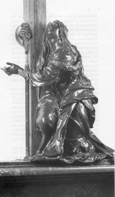 Maria Magdalena aan de voet van het kruis.