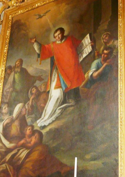 Euplius - in rode diakentuniek - leest voor uit het evangelie aan de arme bevolking In het evangelieboek de tekst: 'Qui vult venire post me, tollat crucem suam et sequatur me' (Wie achter mij aan wil komen, moet zijn kruis op zich nemen en mij volgen' Matteus 16,24; Markus 08,34; Lukas 09,23)