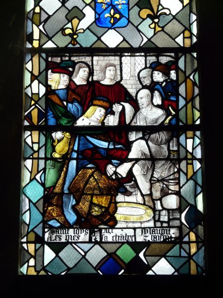 'Saint Loys y lavoit les pieds et les basoit' Lodewijk wast en kust de voeten van armen Lodewijk de Heilige (ook van Frankrijk) ofm.ter.,