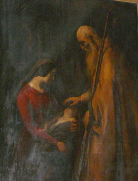 Sint Lupus dient doopsel toe.