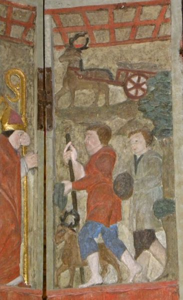St Thégonnec met scènes uit zijn leven. links boven: ossenkar en hert helpen bij bouw kerk.