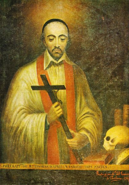 Thomas draagt een priesterstola. De boeken op de achtergrond verwijzen naar zijn geleerdheid. Het kruis in zijn handen en de schedel naast hem duiden op zijn leven van gebed en boete.