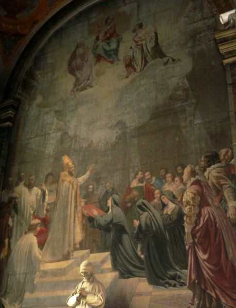 Ontvangt uit handen van Sint Franciscus van Sales de Ordesregel.